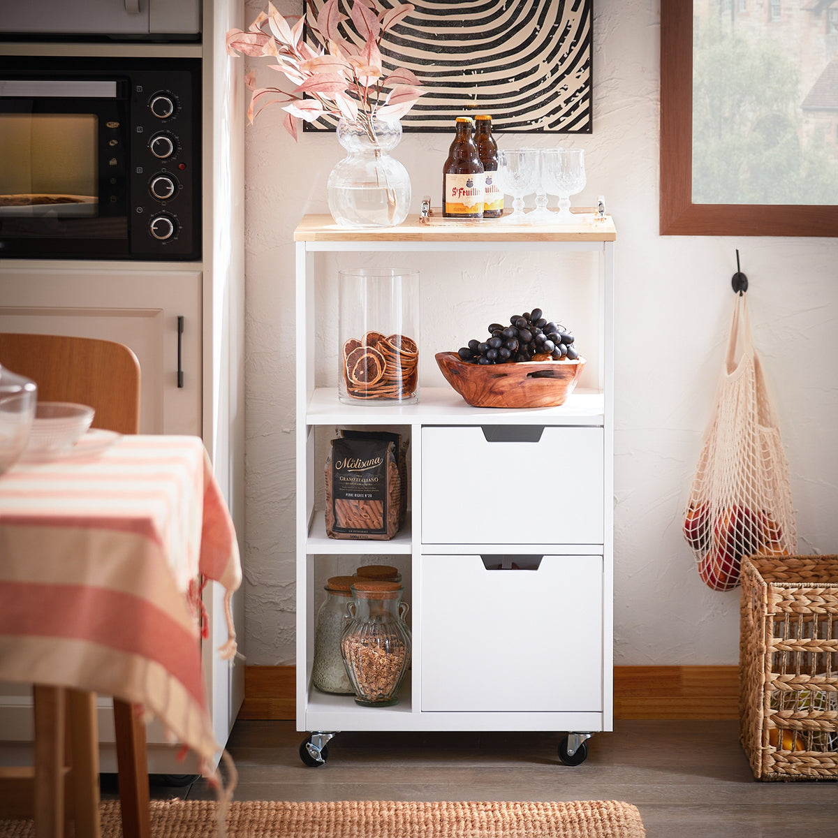 SoBuy FKW111-WN white rolling kitchen trolley in kitchen setting – rubber wood worktop 2 drawers 3 open shelves