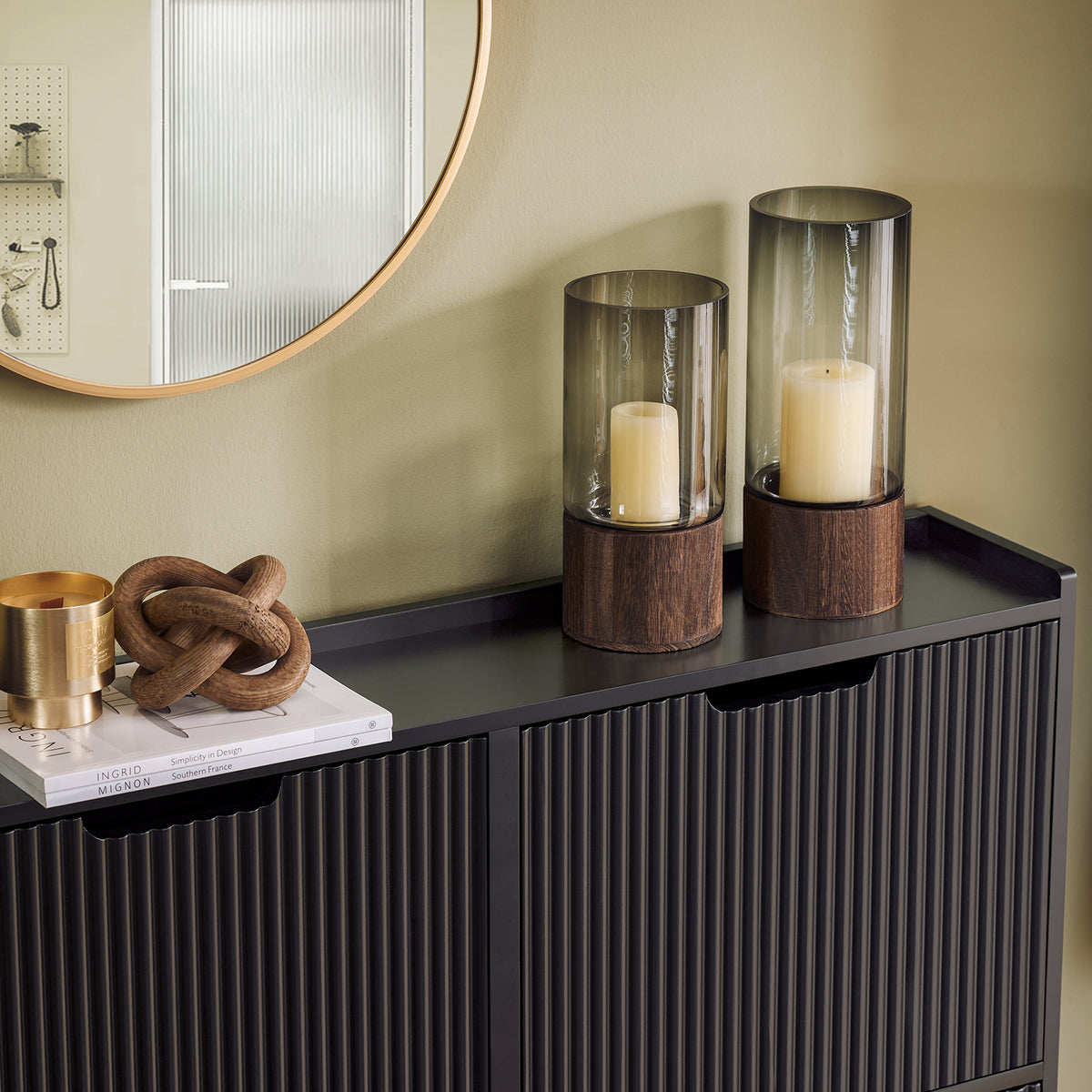 The top of this hallway shoe storage cabinet unit provides extra space for keys, decor, or mail.