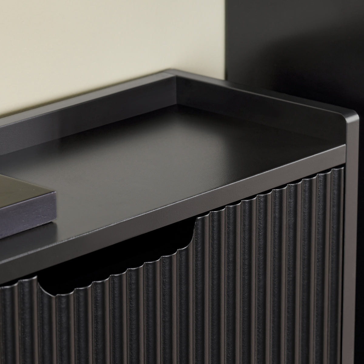 The top of this hallway shoe storage cabinet provides extra space for keys, décor, or mail
