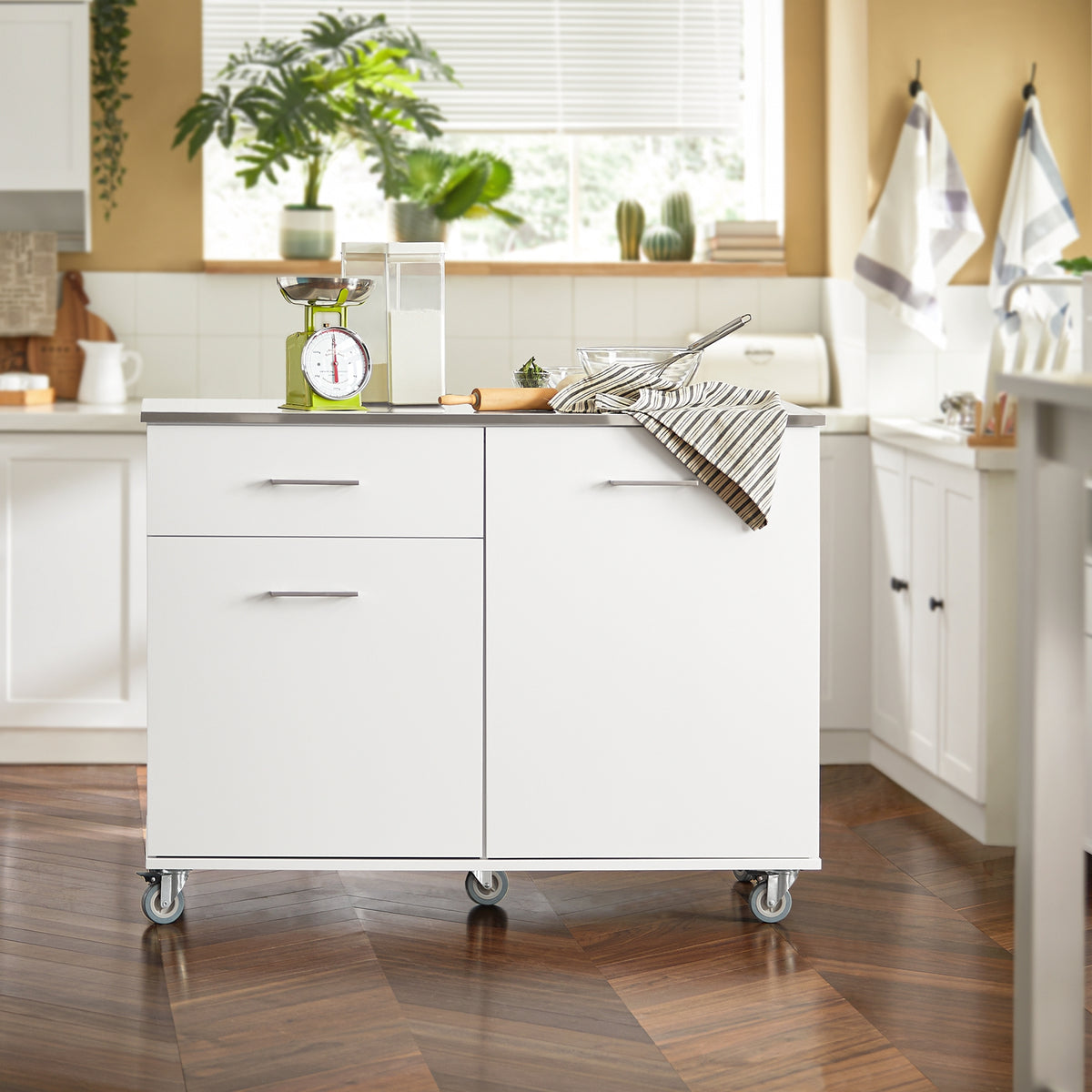 SoBuy FKW117-W white rolling kitchen island in kitchen setting – stainless steel worktop 143kg load capacity