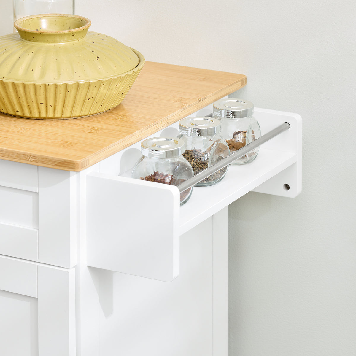 SoBuy FKW13-II-WN spice rack close-up – integrated condiment storage keeping worktop clear on white kitchen trolley