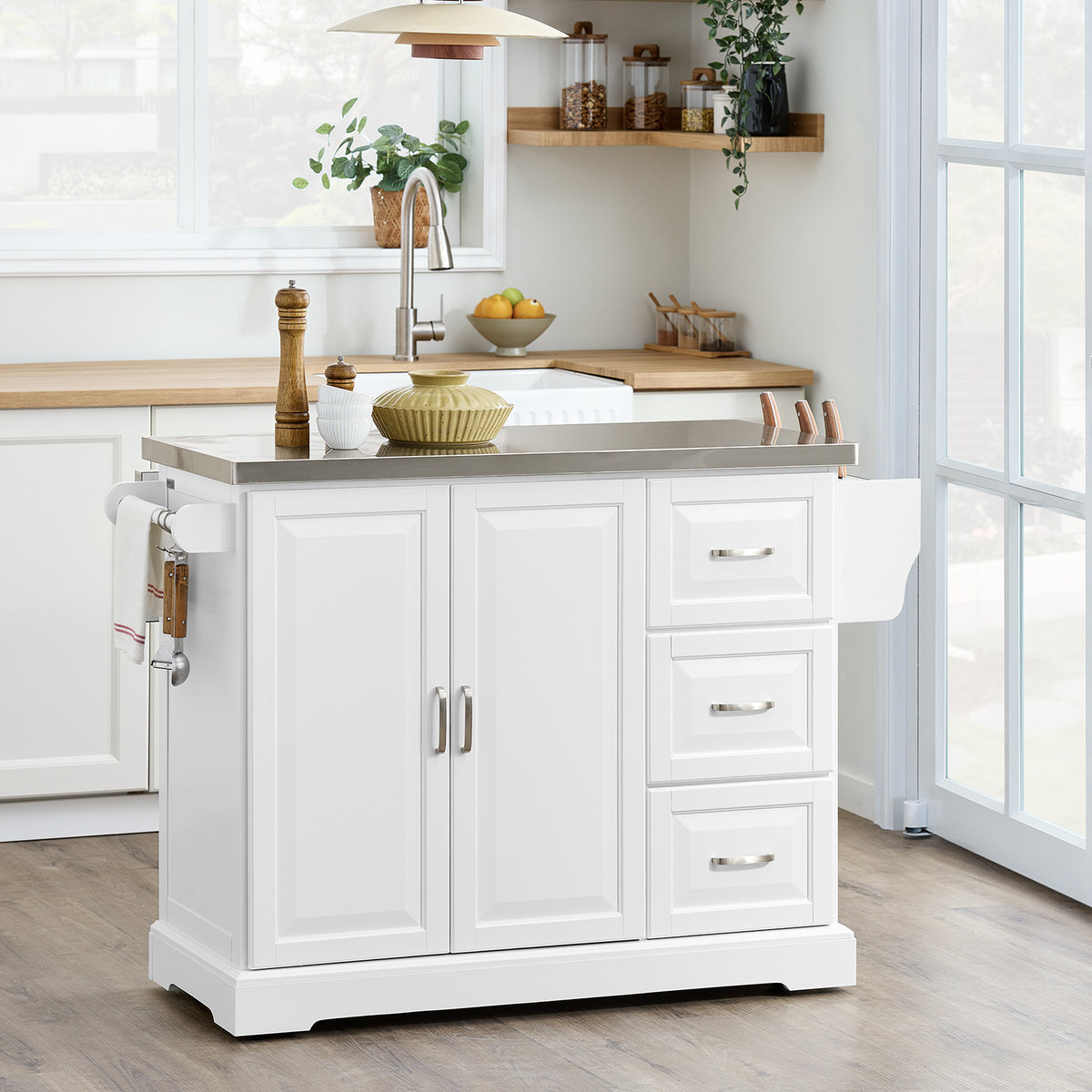 SoBuy FKW41-III-ST freestanding white kitchen island in modern kitchen setting with extended stainless steel worktop 130cm wide