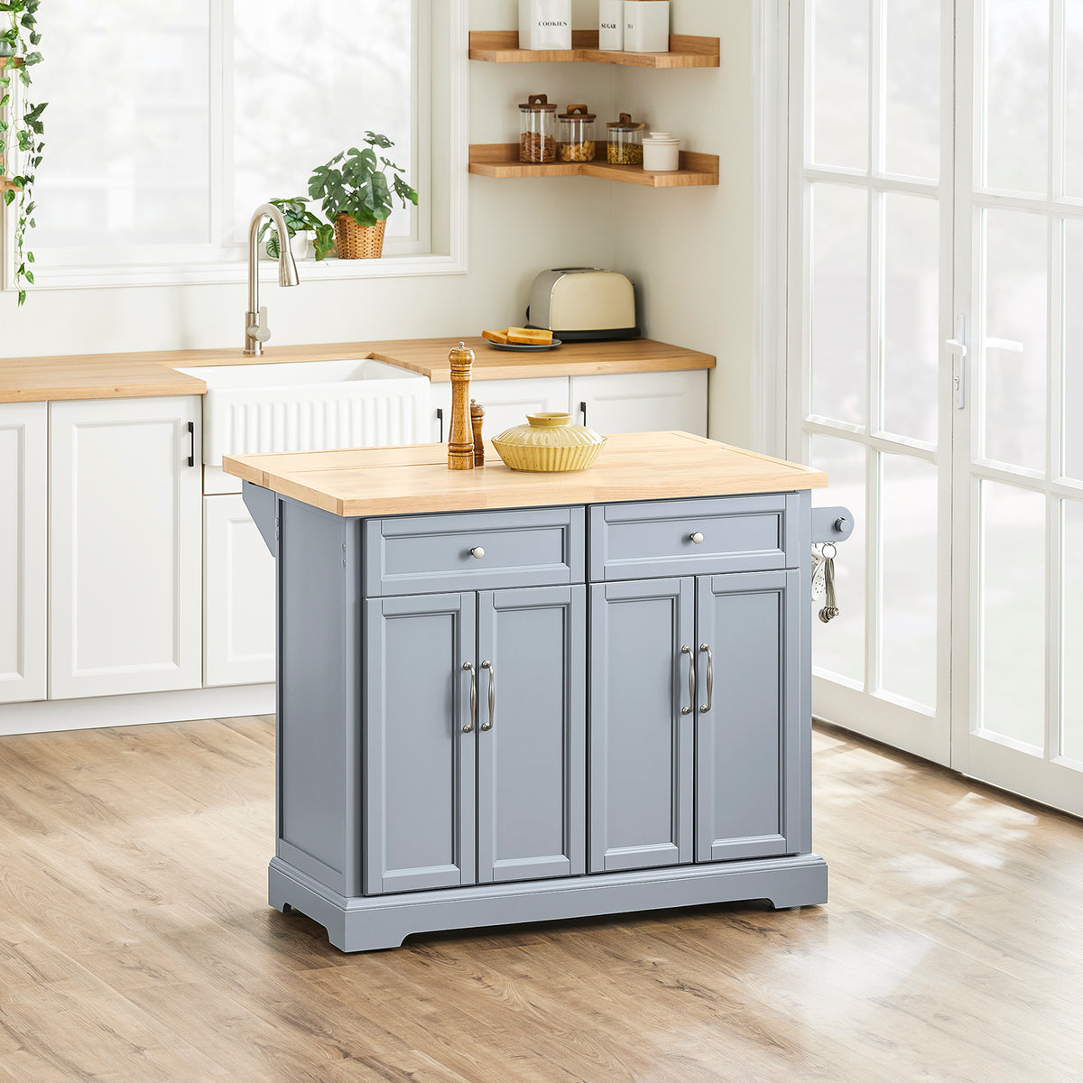 SoBuy FKW71-II-HG freestanding grey kitchen island in modern kitchen setting with extended rubber wood worktop