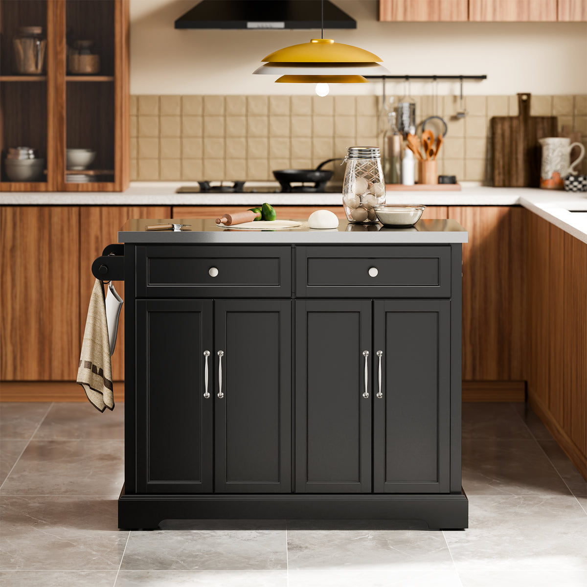 SoBuy FKW71-III-SCH freestanding black kitchen island in modern kitchen setting with extended stainless steel worktop
