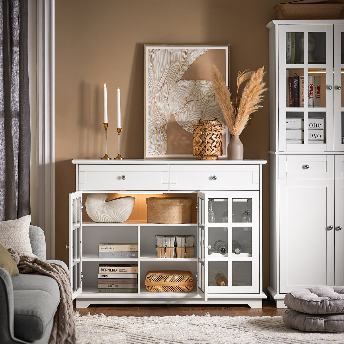 SoBuy FSB77-W white storage cabinet in living room setting with decorative items on top