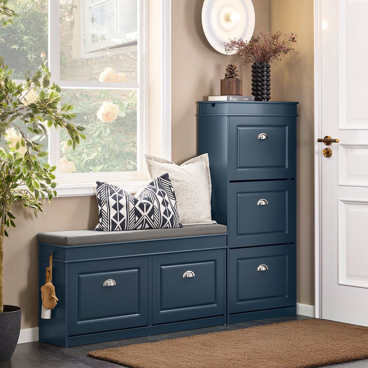 Wide blue shoe storage bench 104cm in hallway entrance.