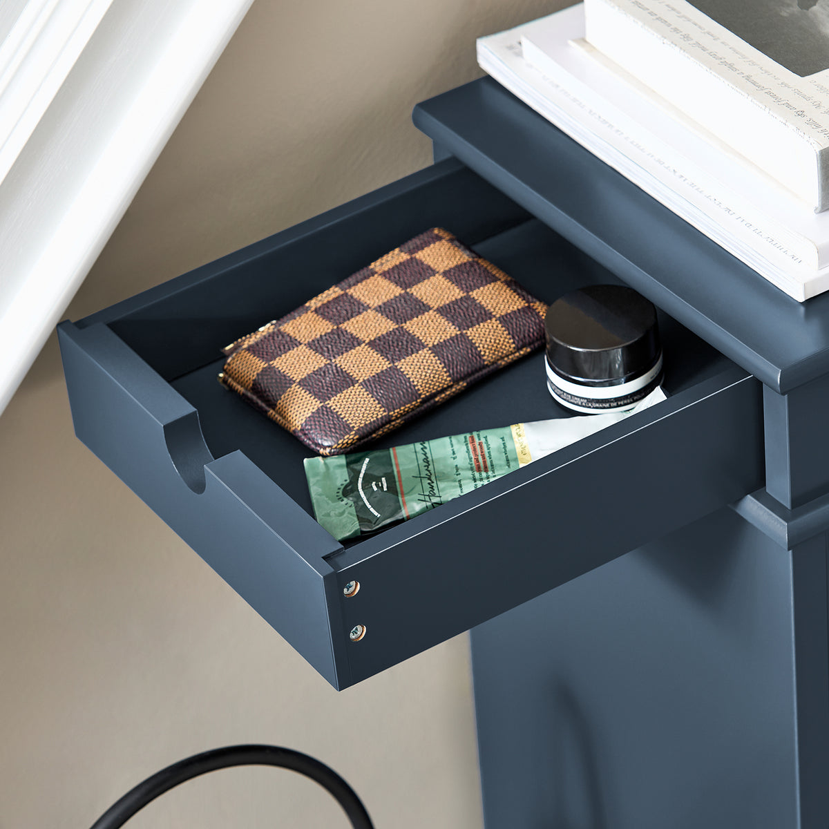 Includes a built-in drawer for shoe polish, keys or slippers.