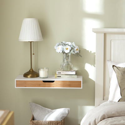 SoBuy FRG93-WN wall mounted floating shelf in bedroom setting – white natural bamboo bedside shelf